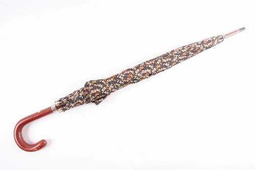 Lot 340 - A Ferragamo silk umbrella printed with horses...