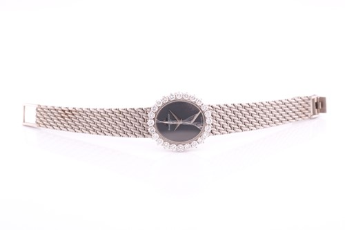 Lot 386 - A white metal ladies Baume and Mercier...