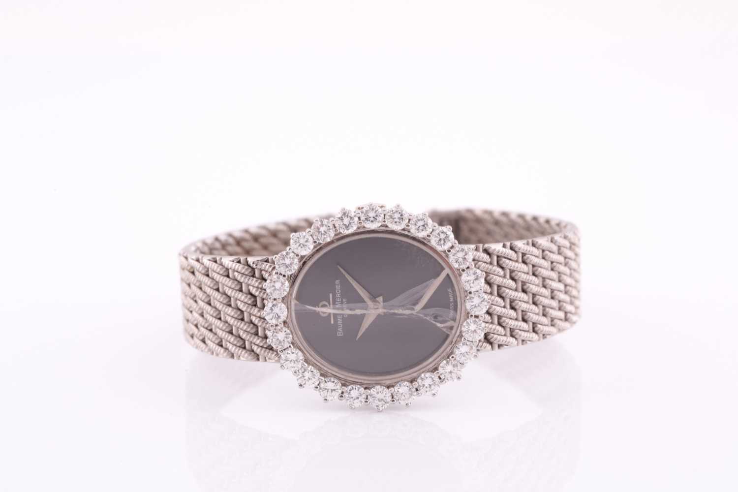 Lot 386 - A white metal ladies Baume and Mercier...