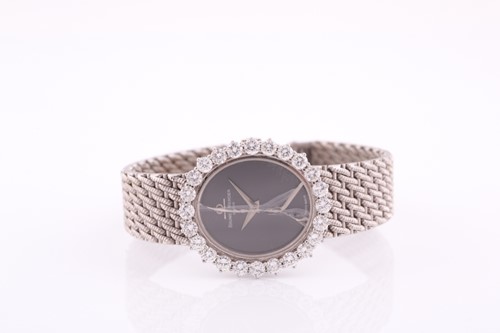 Lot 386 - A white metal ladies Baume and Mercier...