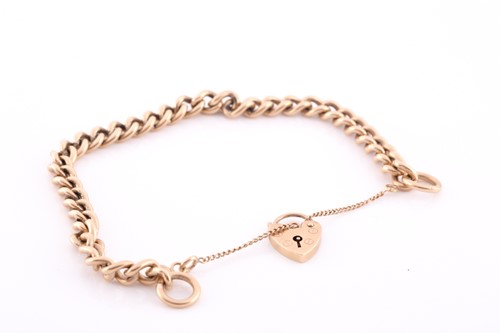 Lot 132 - A yellow metal curb-link bracelet, likely late...