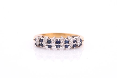 Lot 2 - A sapphire and diamond half hoop ring; the...