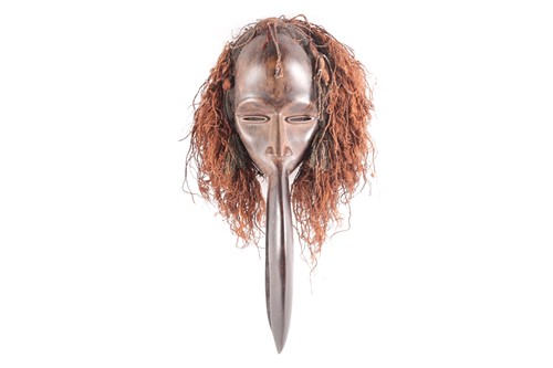 Lot 231 - A Dan hornbill 'Kagle' mask, Liberia/Ivory...