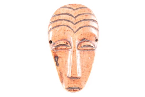 Lot 237 - A Lega (Idimu) animal bone Bwami mask,...