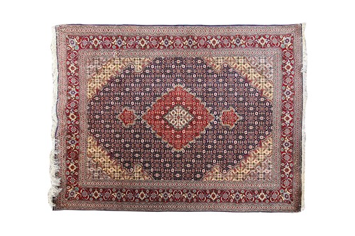 Lot 376 - A fine 20th blue ground Tabriz rug with a...