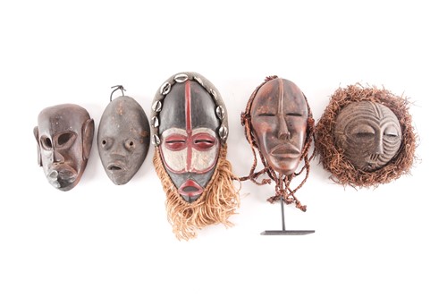 Lot 242 - Three Dan passport masks, Ivory coast, one...