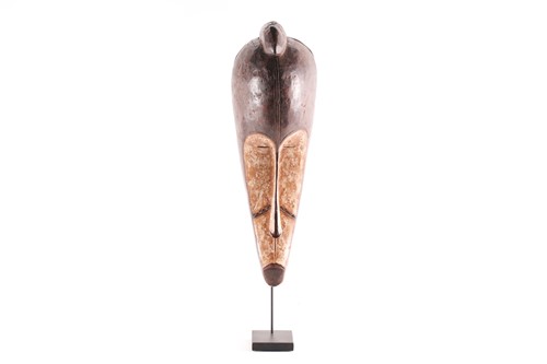 Lot 244 - A Fang mask, Ngil, Gabon, a short crest above...