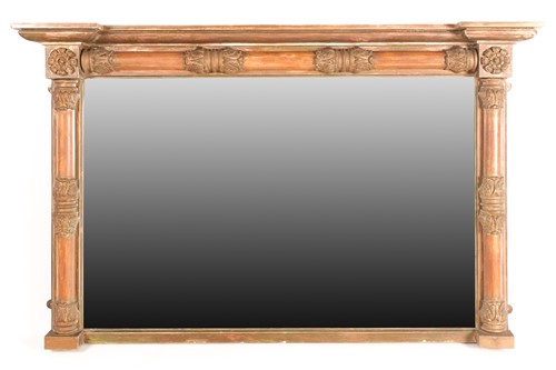 Lot 386 - A Regency inverted breakfront carved wood and...