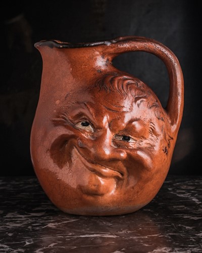 Lot 545 - A Martin Brothers large double-sided stoneware...