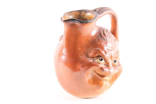 Lot 545 - A Martin Brothers large double-sided stoneware...
