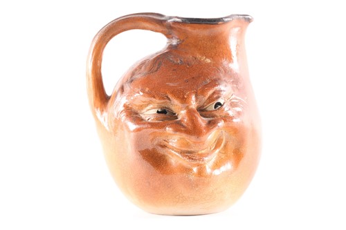 Lot 545 - A Martin Brothers large double-sided stoneware...