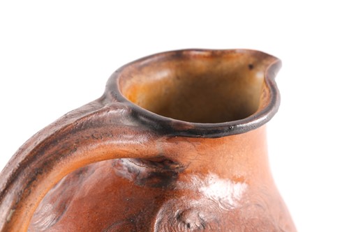 Lot 545 - A Martin Brothers large double-sided stoneware...