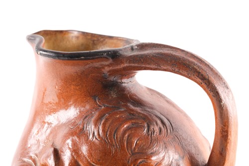 Lot 545 - A Martin Brothers large double-sided stoneware...