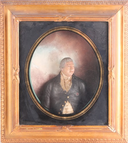 Lot 458 - An 18th century painted relief wax half-length...