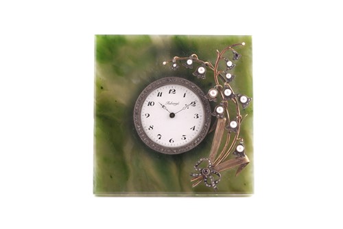 Lot 273 - A Russian clock in Faberge style, the round...