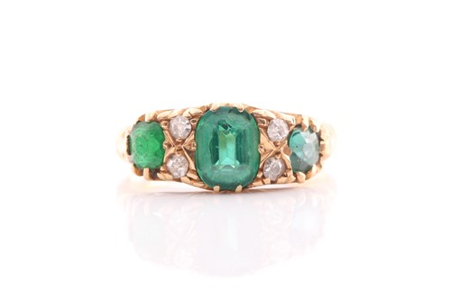 Lot 38 - An Edwardian 18ct gold, green garnet-topped...