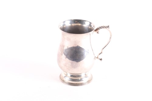 Lot 282 - A 20th century silver pint tankard, Birmingham...