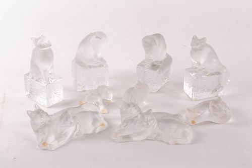 Lot 403 - A collection of eight Lalique frosted cat...