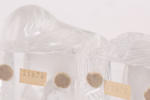 Lot 403 - A collection of eight Lalique frosted cat...
