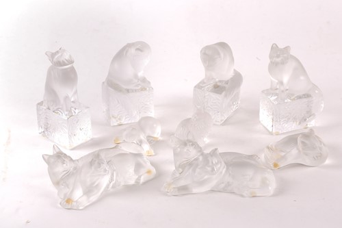 Lot 403 - A collection of eight Lalique frosted cat...