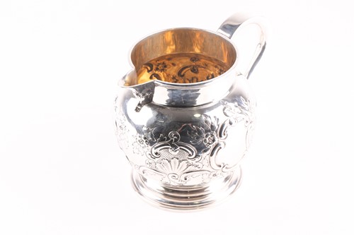 Lot 329 - A late Victorian silver water jug, London 1897...
