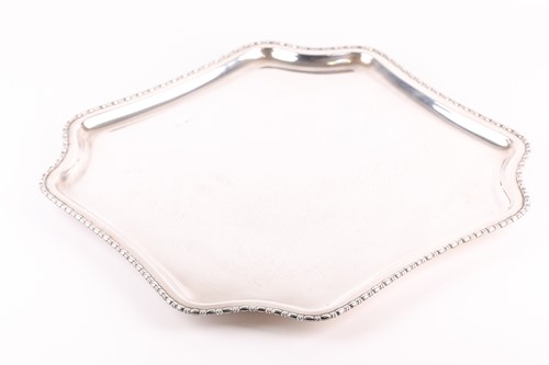 Lot 317 - An English silver salver, (hallmarks rubbed,...