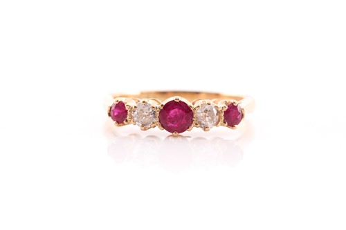 Lot 163 - A ruby and diamond five stone ring set in 18...