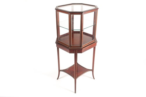 Lot 104 - A mahogany and brass bijouterie cabinet, circa...