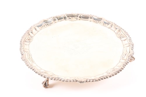 Lot 308 - A George III circular silver salver, London...