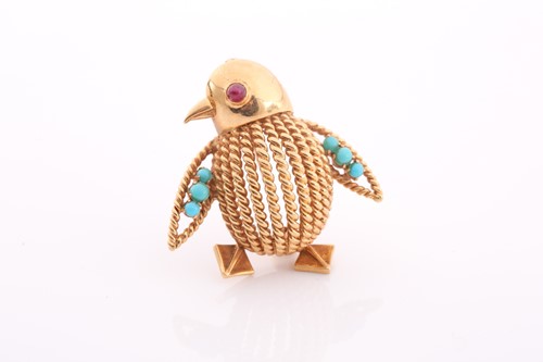 Lot 117 - An 18ct gold, ruby and turquoise brooch in the...