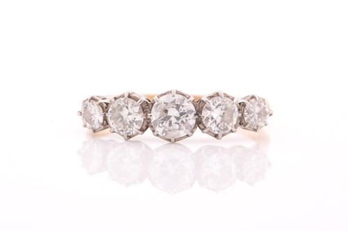 Lot 51 - An early 20th century gold and diamond five...