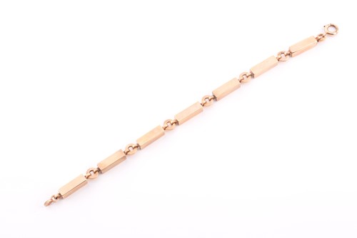 Lot 1 - An early 20th century 9ct rose gold block...