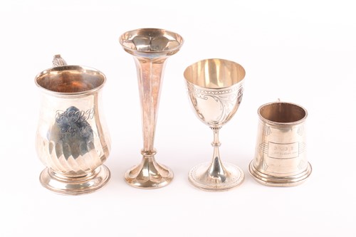 Lot 315 - An Edwardian silver baluster pint tankard,...