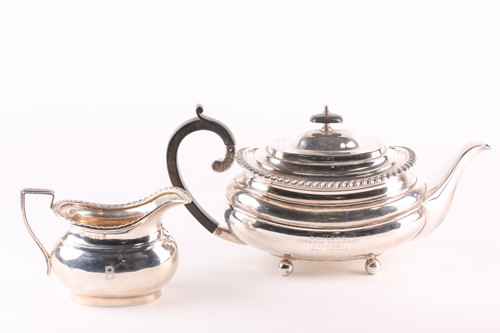 Lot 311 - A George VI silver boat form teapot and a...