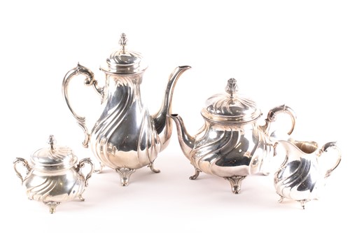 Lot 338 - A 20th century German (800) silver four piece...