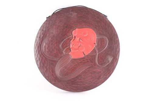 Lot 259 - A Japanese lacquered wood circular plaque,...