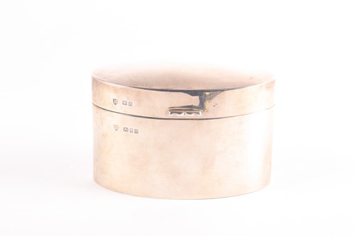 Lot 300 - A George V silver tea caddy of plain, oval...