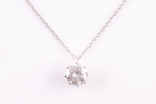 Lot 61 - A solitaire diamond pendant, set with a round...