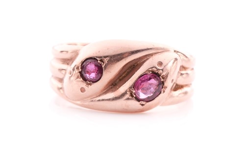 Lot 97 - A 9ct yellow gold and ruby double-headed snake...