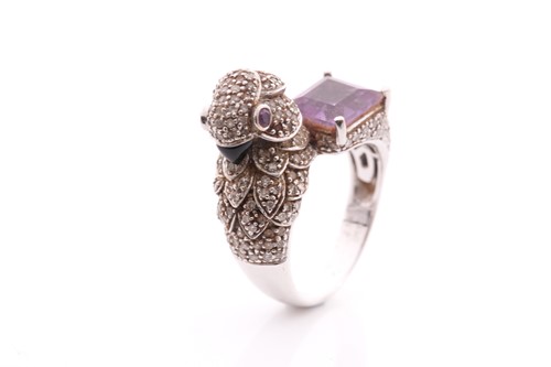 Lot 126 - An unusual 18ct white gold, diamond, and...