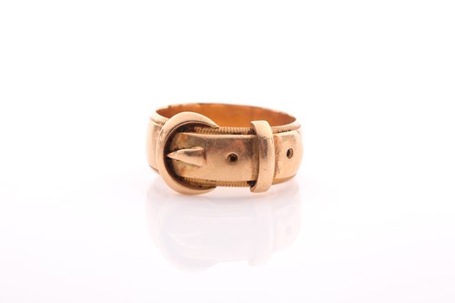 Lot 232 - A late Victorian 18 carat gold buckle ring...