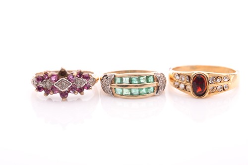 Lot 37 - A 9 carat gold ruby and diamond triple cluster...
