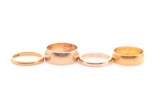 Lot 115 - A 22 carat gold wedding band, another 22 carat...