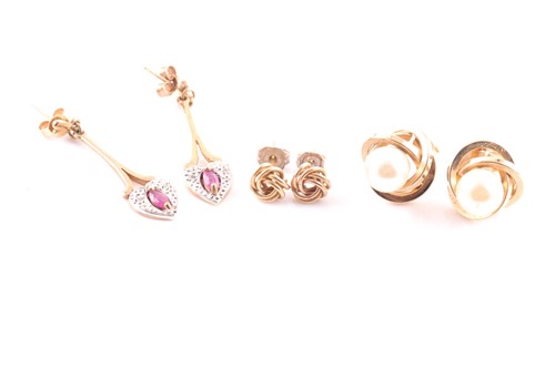 Lot 168 - A pair of ruby and diamond pendant earrings in...