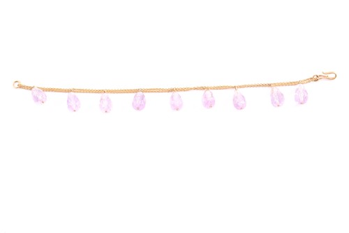 Lot 169 - A yellow metal and amethyst bracelet, the...