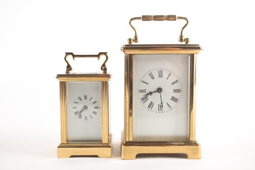 Lot 160 - Two brass carriage clock timepieces, each with...