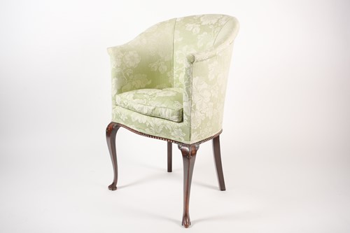 Lot 126 - A George II style hoop backed walnut tub chair...