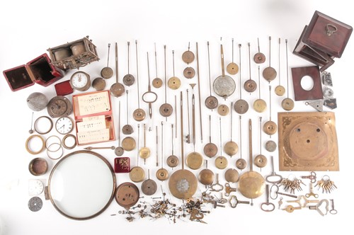 Lot 165 - A collection of assorted clock and watch parts,...