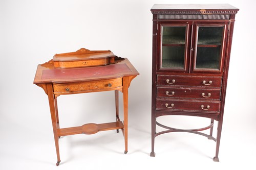 Lot 130 - An Edwardian stepped bowfront lady's rosewood...