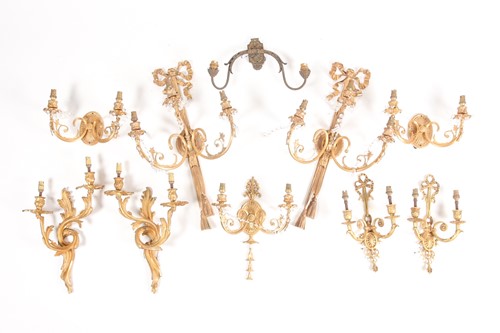 Lot 149 - Assorted sets of ormolu and brass wall sconces,...